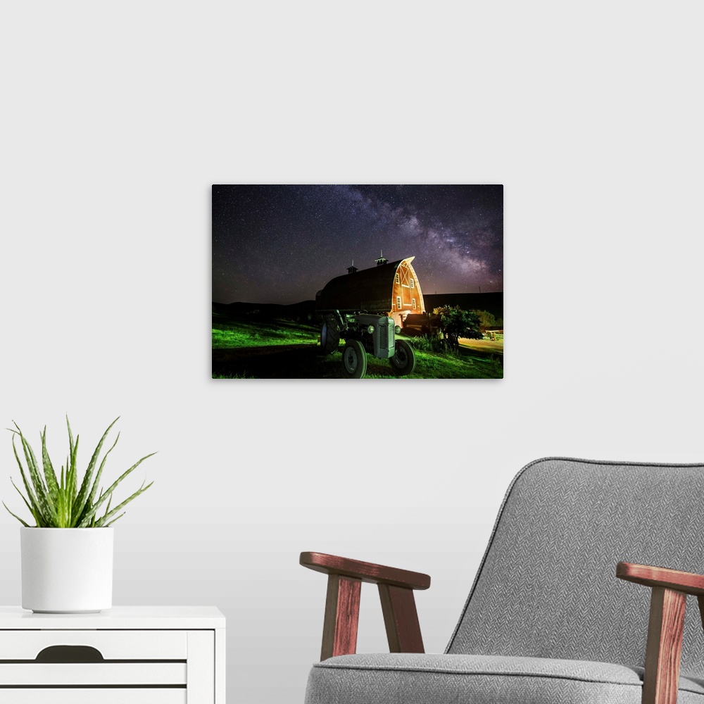A modern room featuring Milky Way over tractor and red barn in the Palouse.