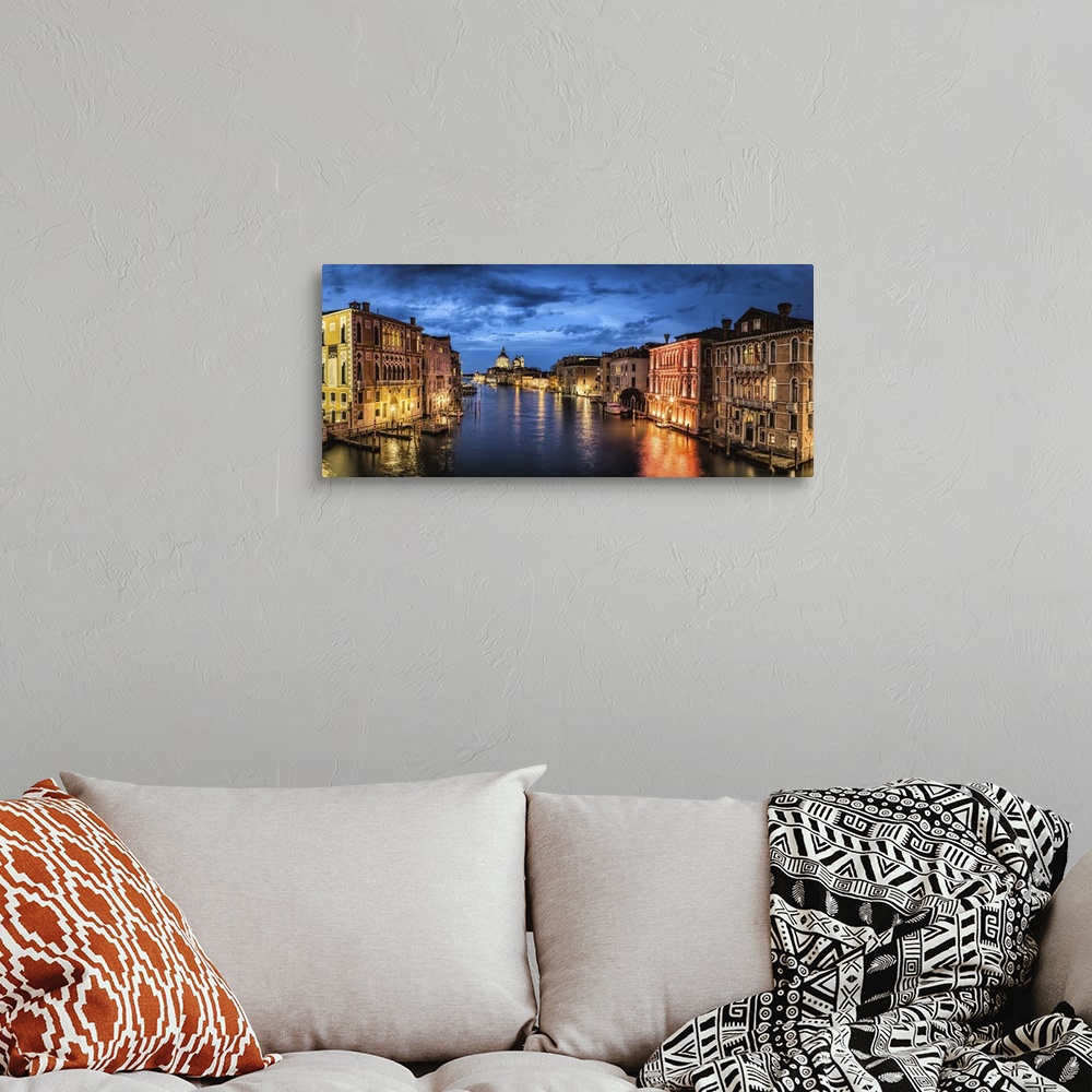 A bohemian room featuring Panorama from the Academia Bridge after dark in Venice, Italy.