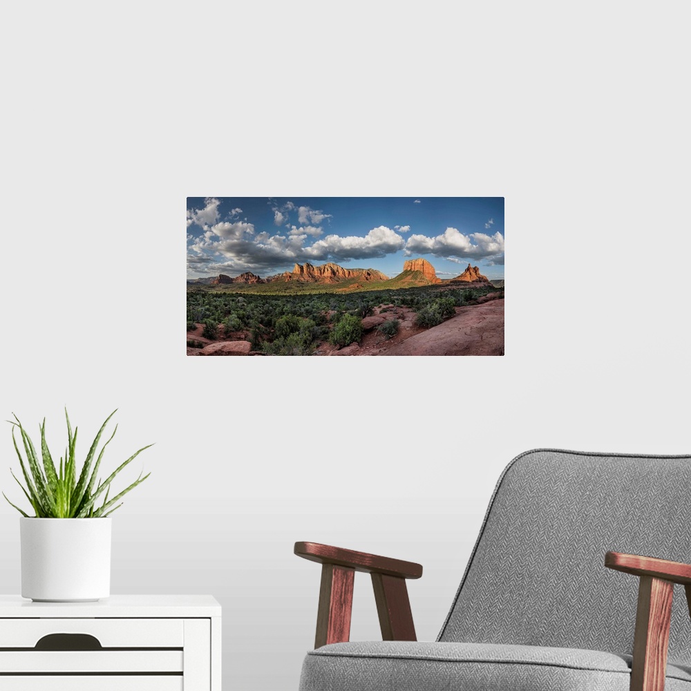 A modern room featuring Panorama of clouds and red rocks at sunset in Sedona, Arizona.