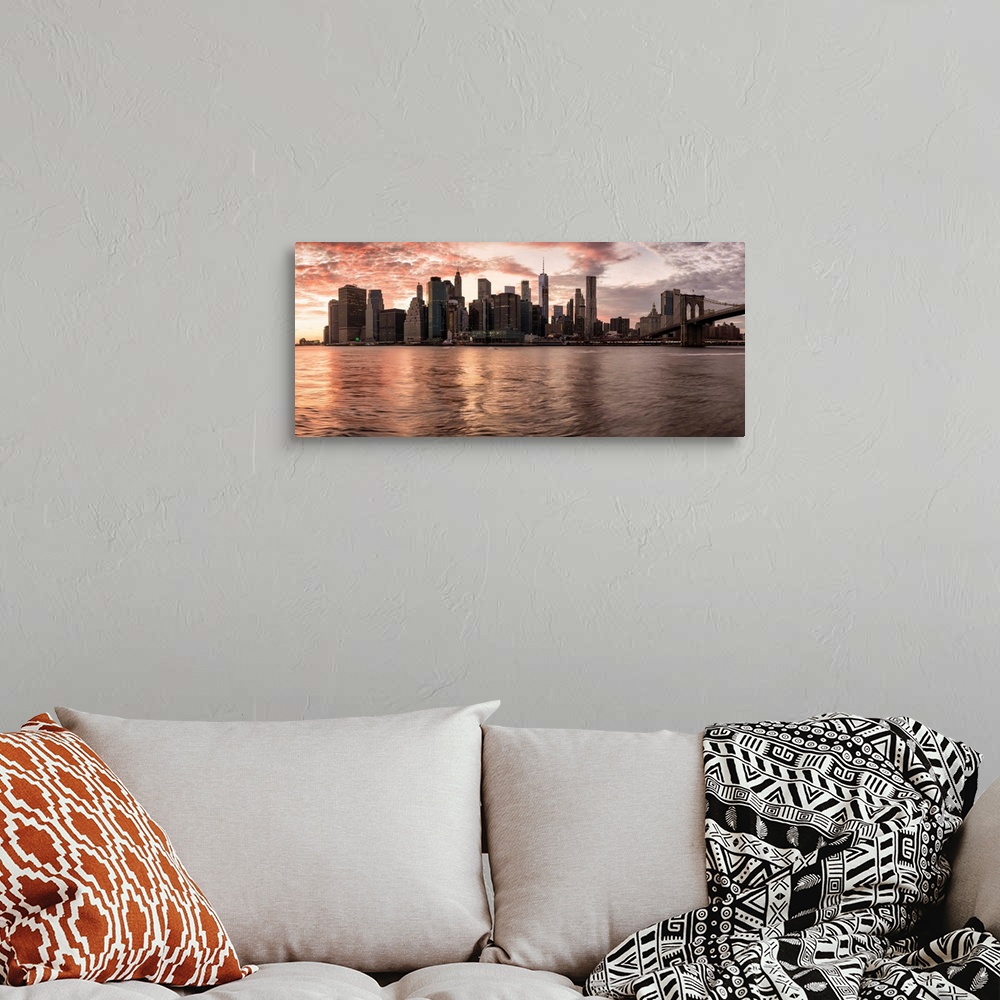 A bohemian room featuring Panorama of New York City skyline at sunset