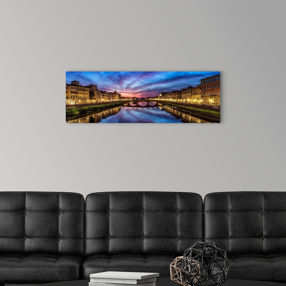 A modern room featuring Panorama over the Arno River at sunset in Florence, Italy