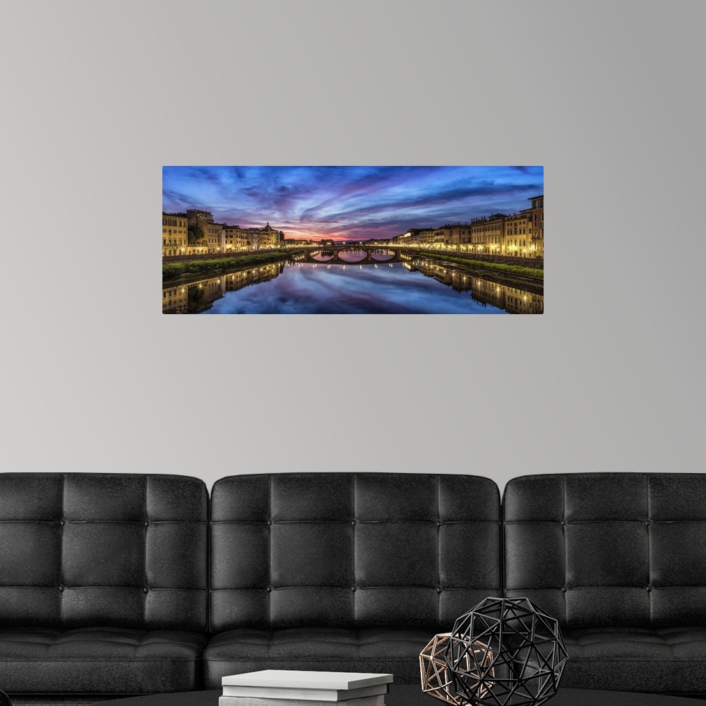 A modern room featuring Panorama over the Arno River at sunset in Florence, Italy