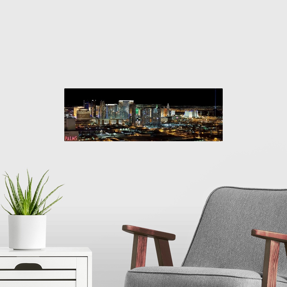 A modern room featuring Panorama view of the Las Vegas strip at night