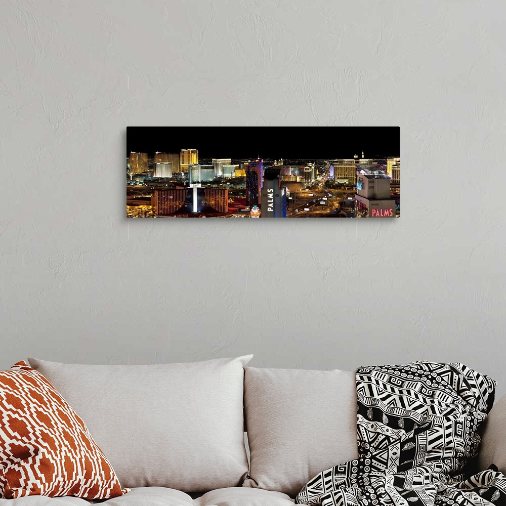 A bohemian room featuring Panorama view of the Las Vegas strip at night