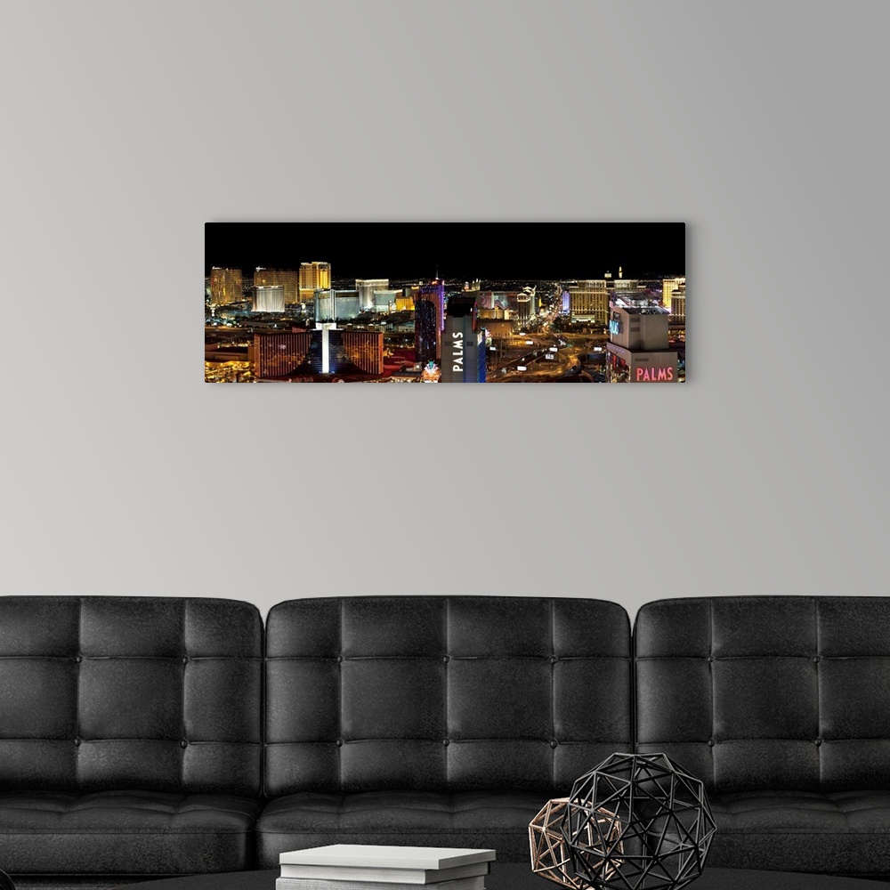 A modern room featuring Panorama view of the Las Vegas strip at night