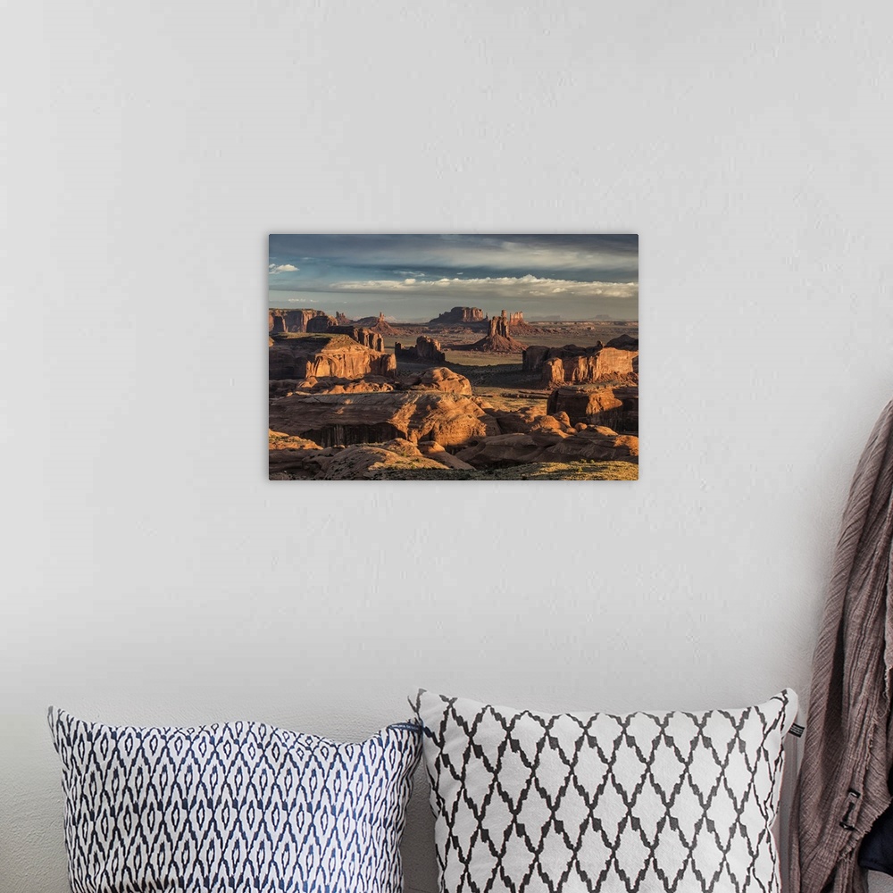 A bohemian room featuring Picturesque Hunts Mesa rock formation in Monument Valley, Utah