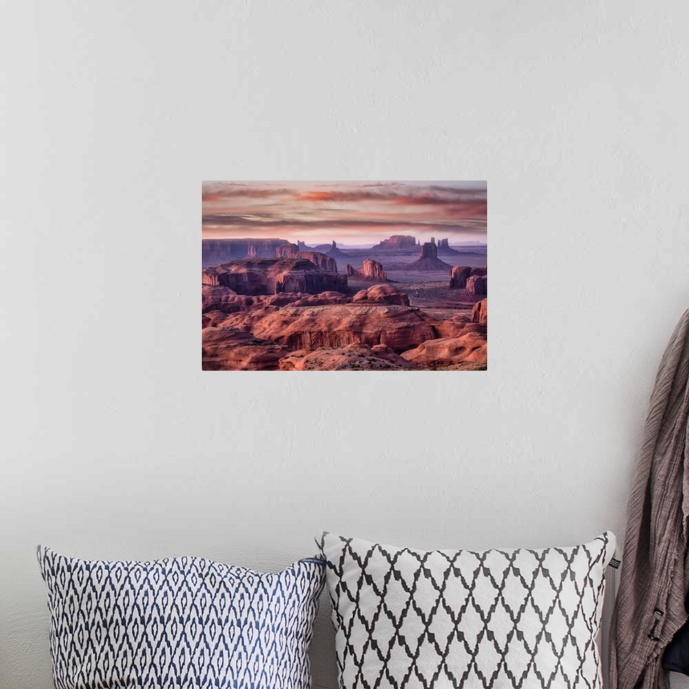 A bohemian room featuring Picturesque Hunts Mesa rock formation in Monument Valley, Utah