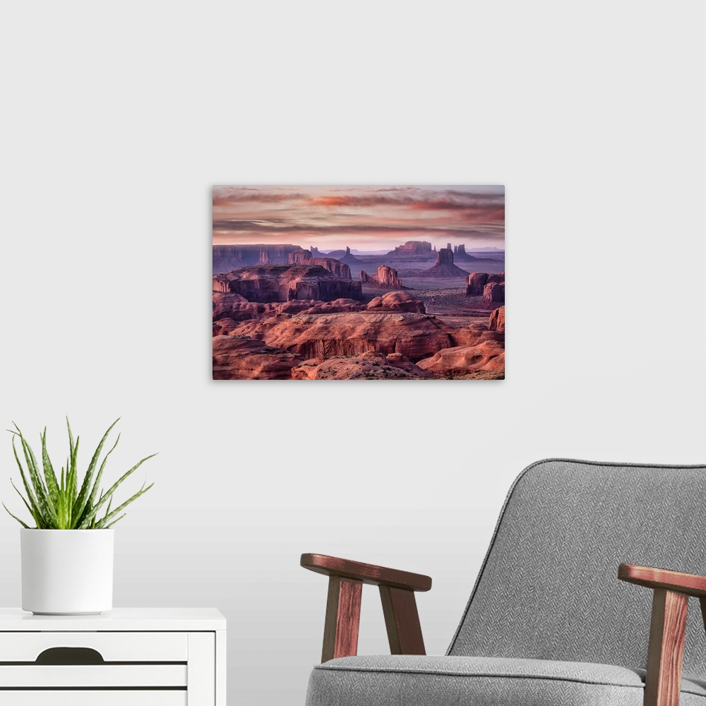 A modern room featuring Picturesque Hunts Mesa rock formation in Monument Valley, Utah