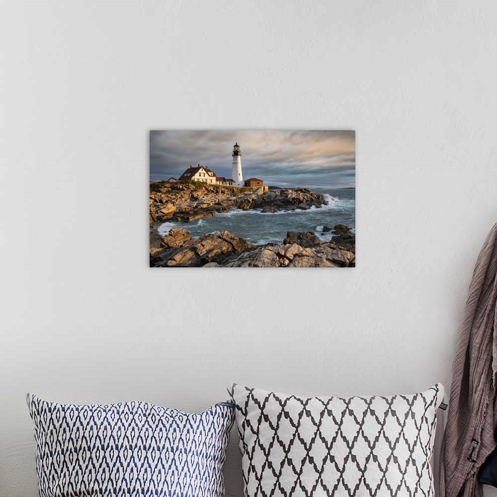 A bohemian room featuring Portland Maine Lighthouse at sunrise.