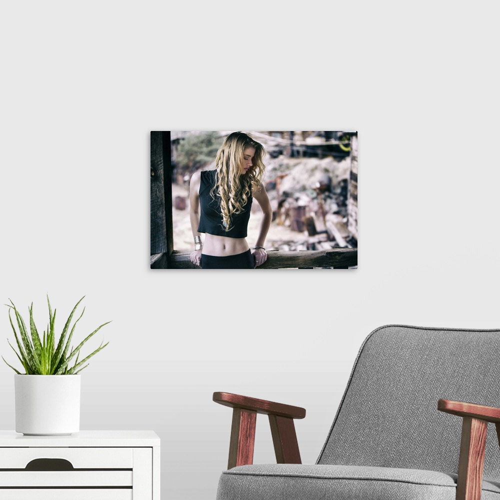 A modern room featuring Portrait of a beautiful and sexy young blond girl