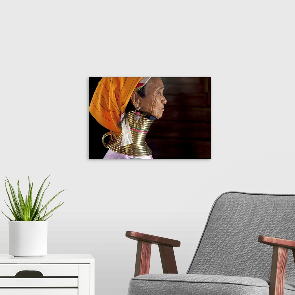 A modern room featuring Profile of a Padaung ring neck woman in Inle Lake, Burma