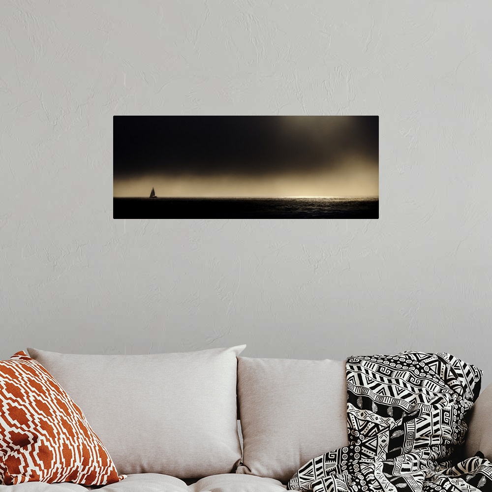 A bohemian room featuring Sailboat at sunset off the coast of California