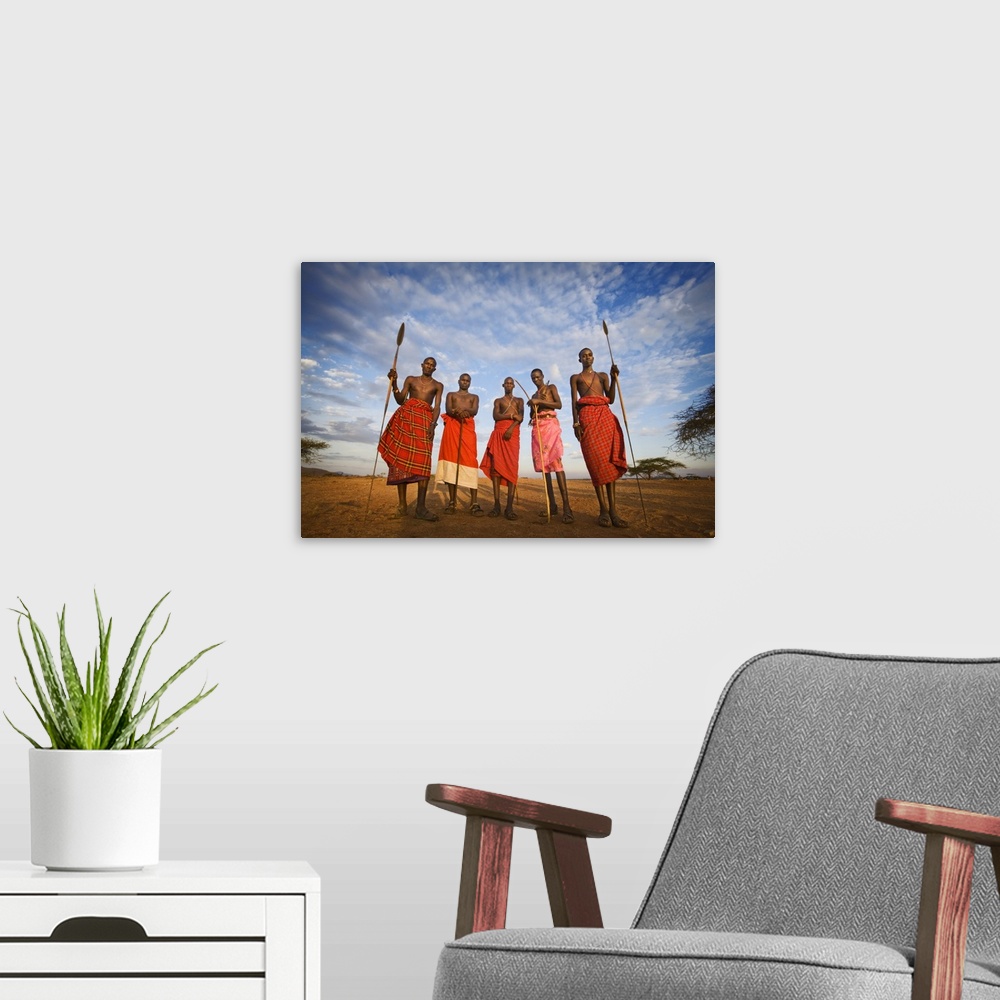 A modern room featuring Samburu tribe at sunset, Kenya, Africa