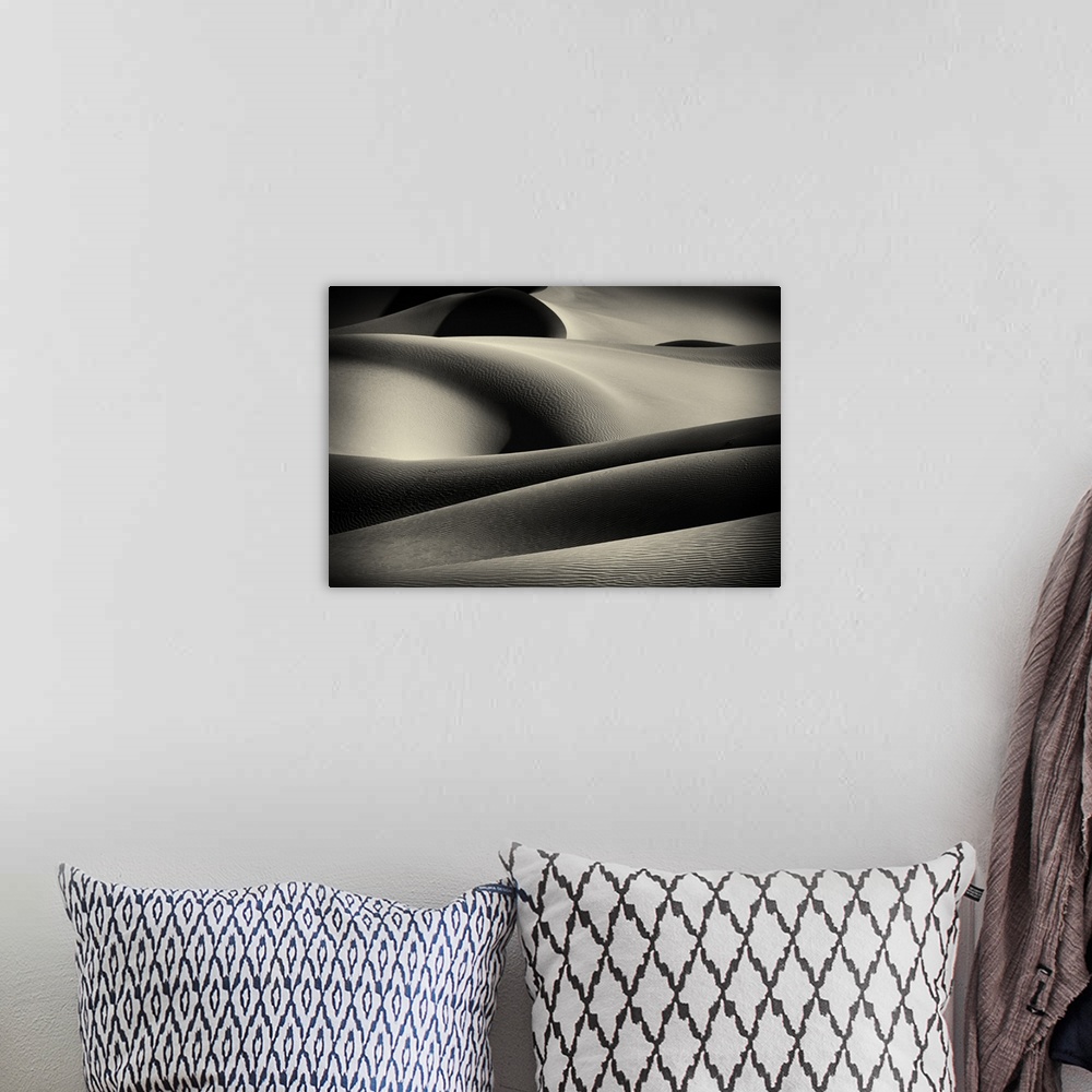 A bohemian room featuring Large photo on canvas of a zoomed in view of sand dunes.