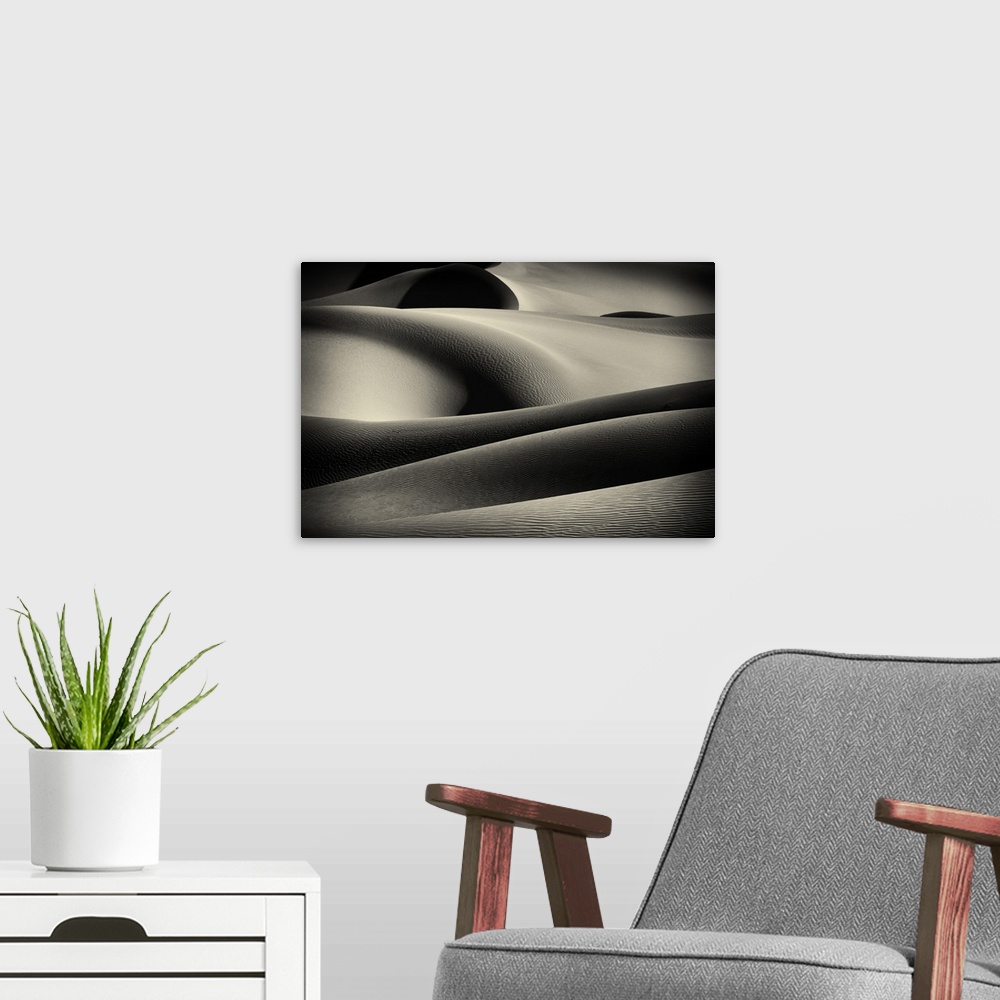 A modern room featuring Large photo on canvas of a zoomed in view of sand dunes.