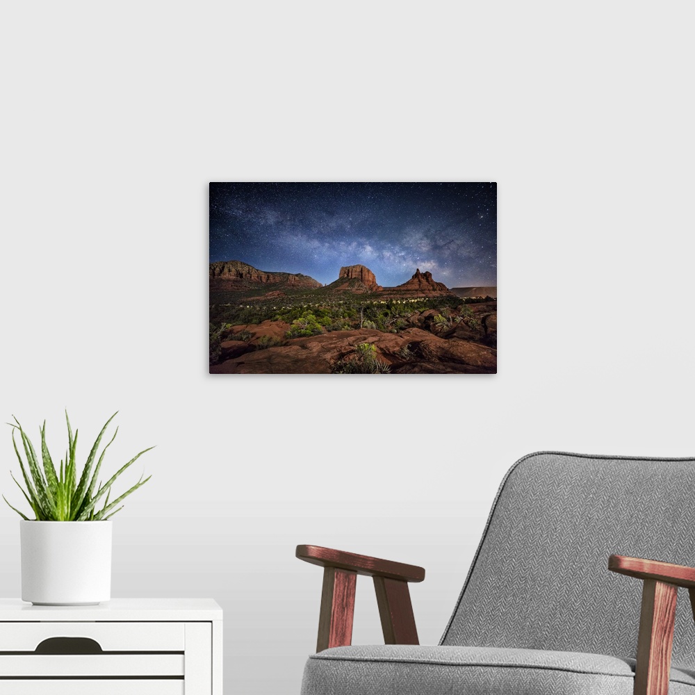A modern room featuring Milky Way above the red rocks of Sedona, Arizona.