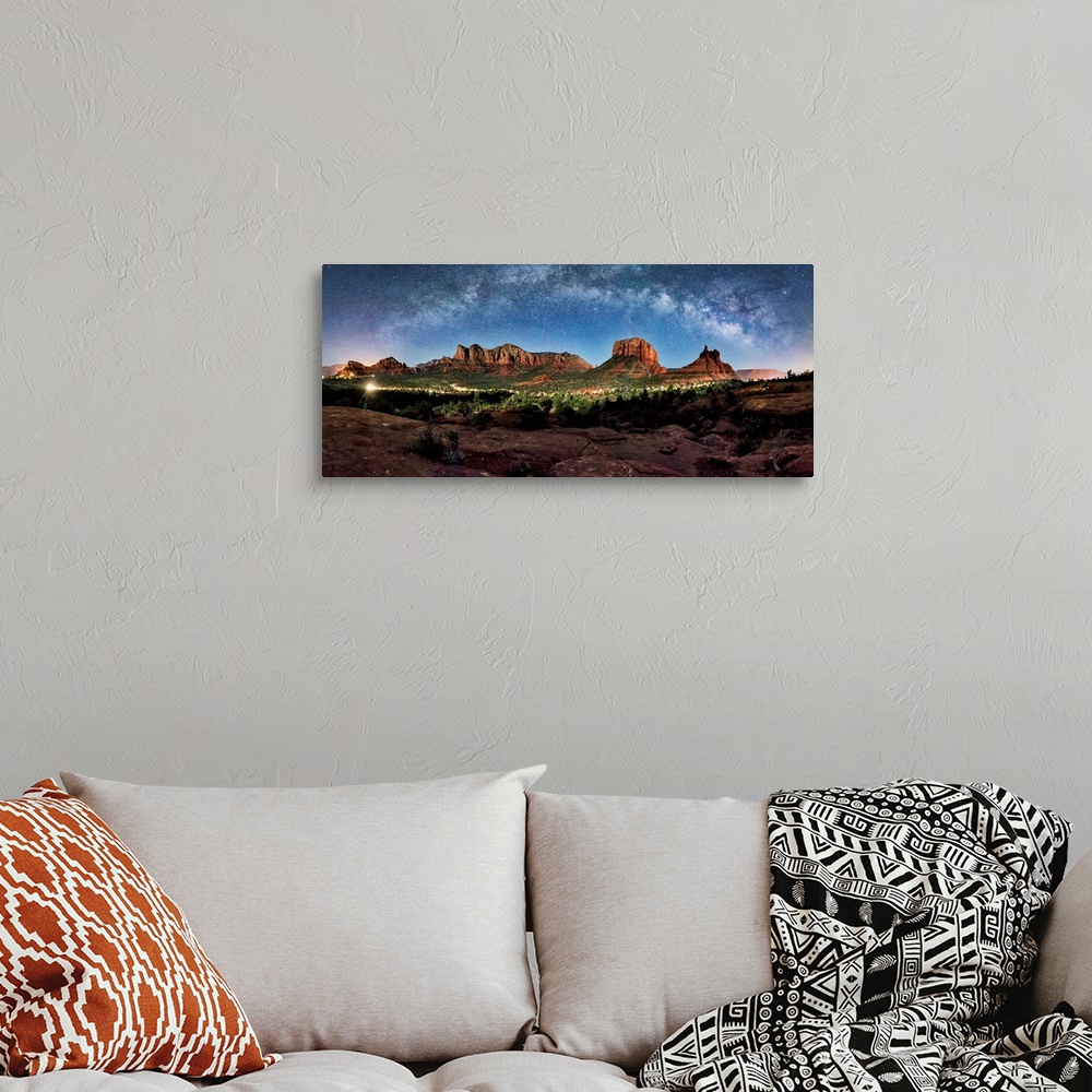A bohemian room featuring Milky Way panorama above the rred rocks of Sedona, Arizona.