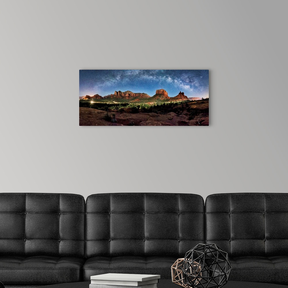A modern room featuring Milky Way panorama above the rred rocks of Sedona, Arizona.