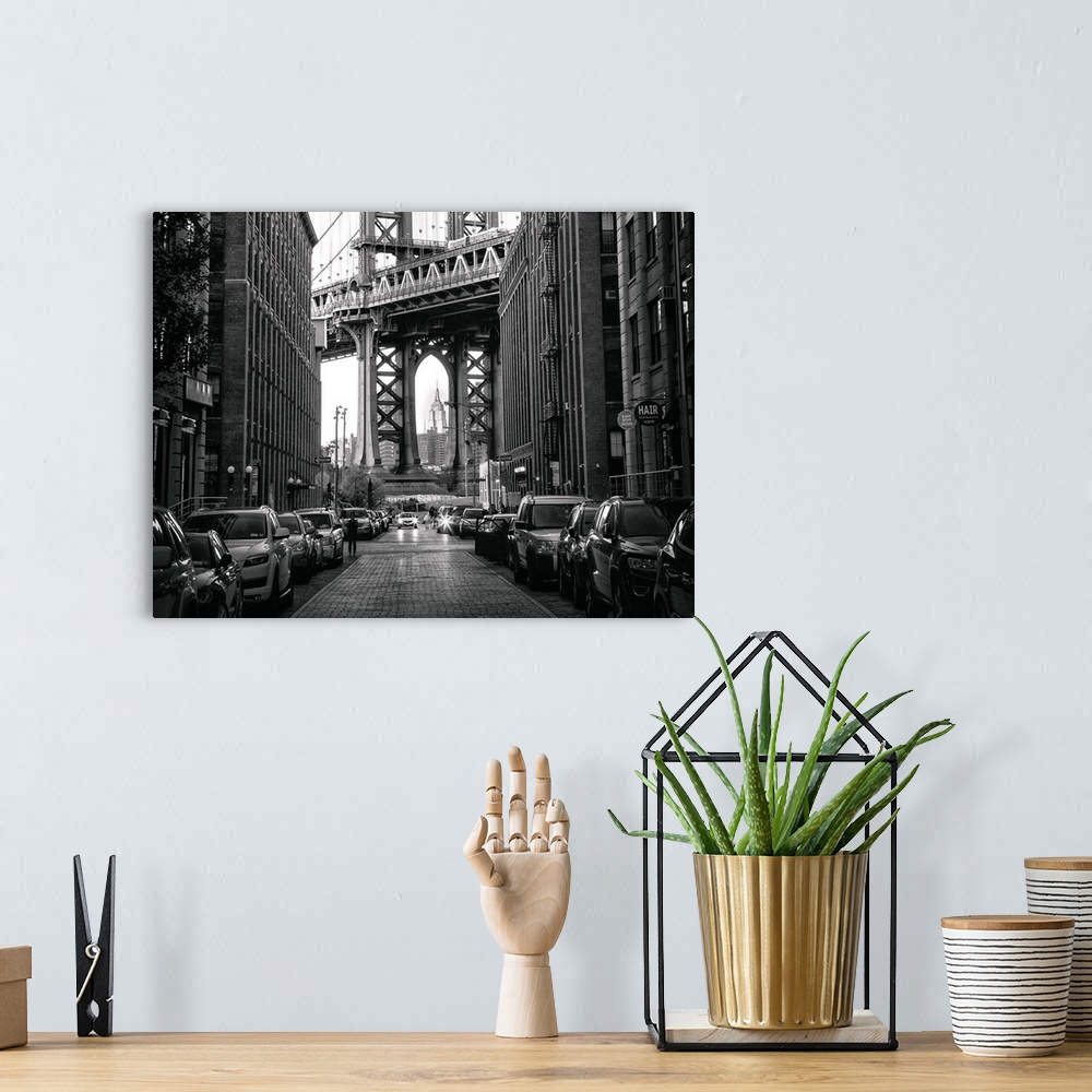 A bohemian room featuring Sidestreet with a view of the Manhattan Bridge in New York City.