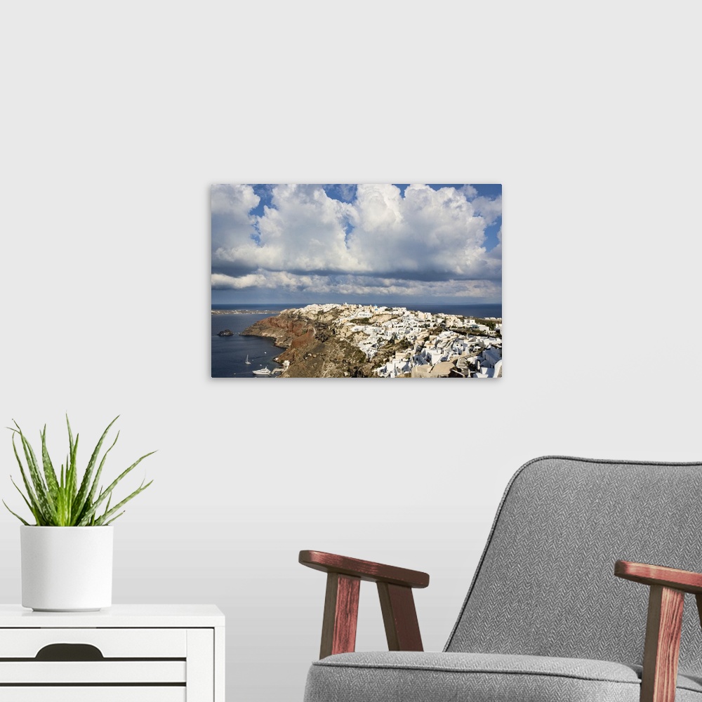 A modern room featuring Skyline and coast of Oia, Santorini, Greece