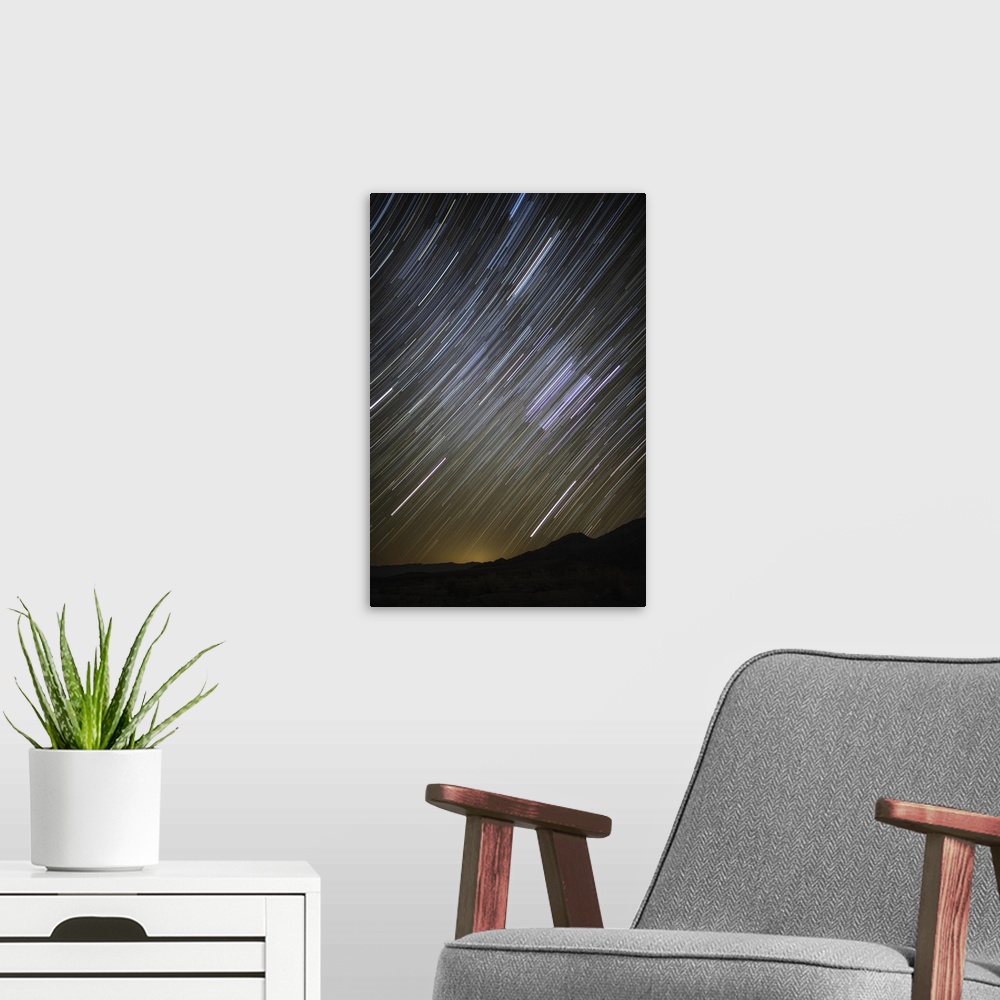 A modern room featuring Star trails over Death Valley