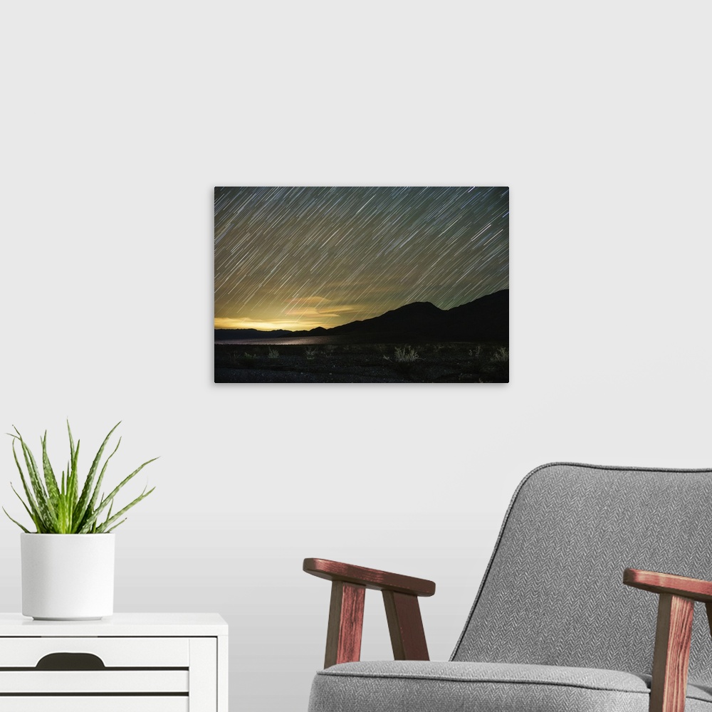 A modern room featuring Star trails over Death Valley National Park