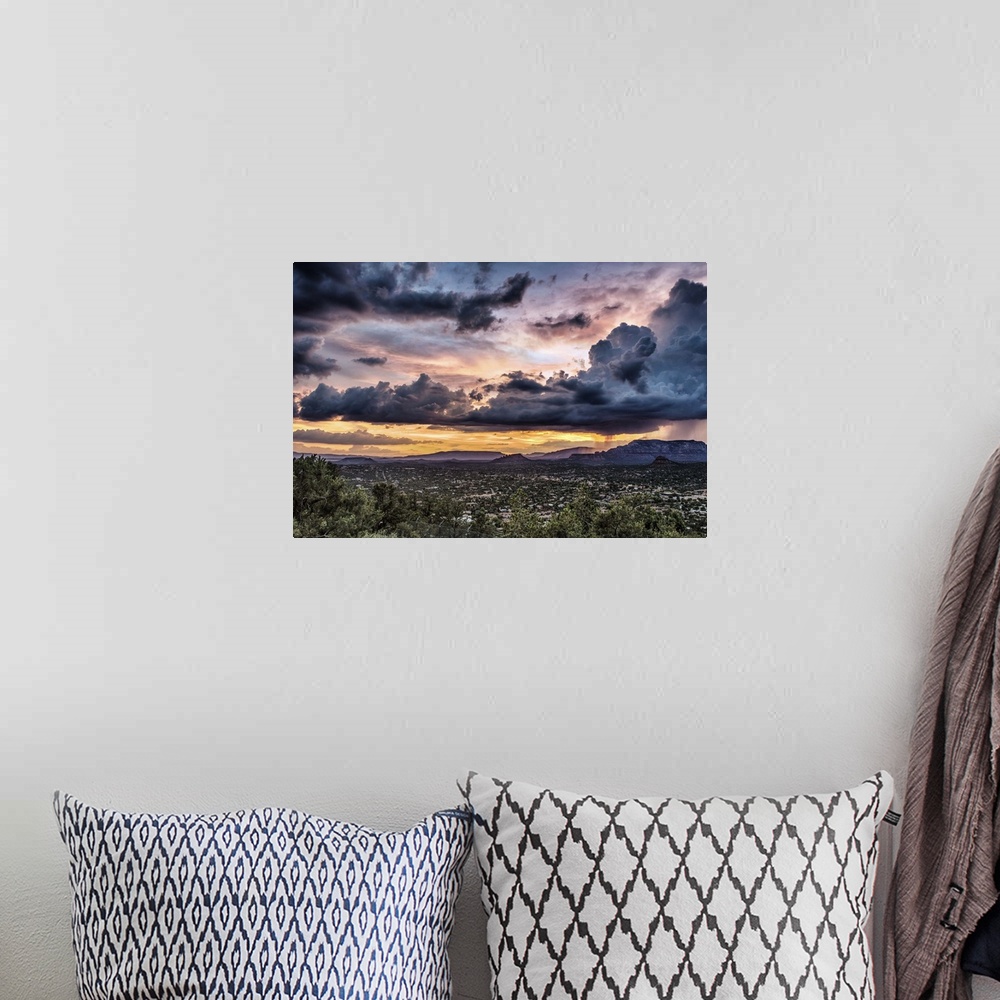 A bohemian room featuring Sunset and storm over Sedona, Arizona