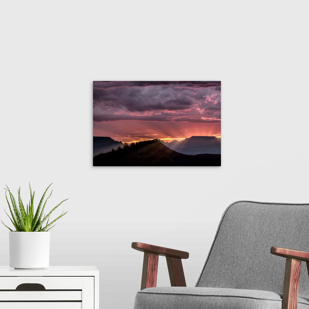 A modern room featuring Sunset with clouds over Sedona, Arizona