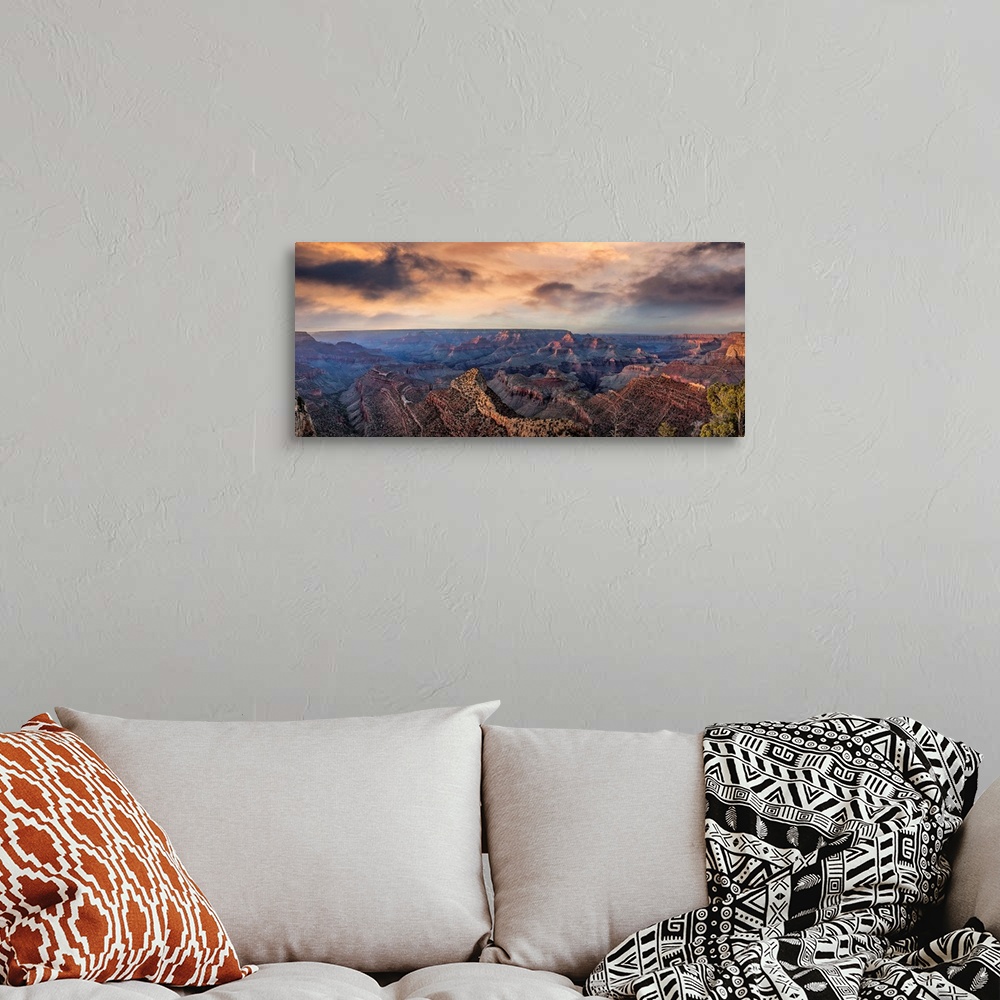 A bohemian room featuring Sunset with clouds panorama in the Grand Canyon.