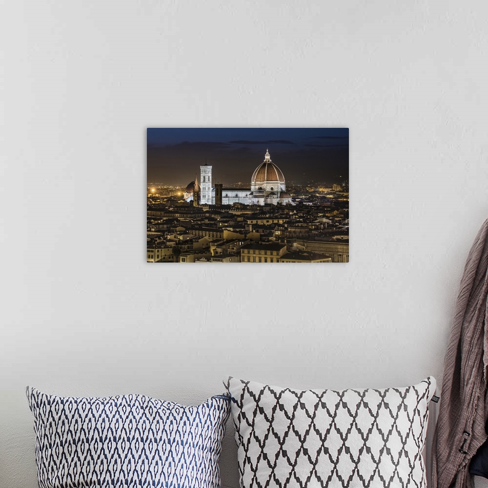 A bohemian room featuring The Duomo after dark in Florence, Italy