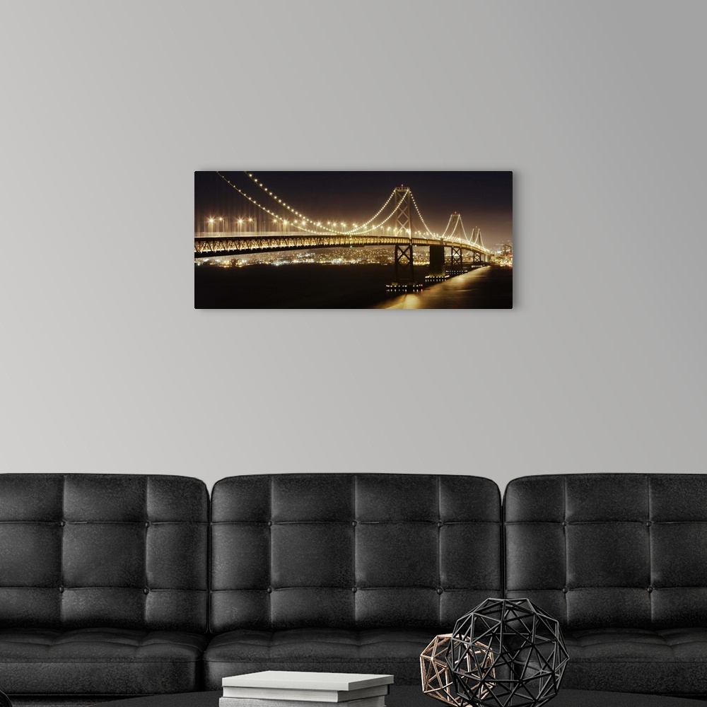 A modern room featuring The Oakland Bay Bridge and San Francisco skyline