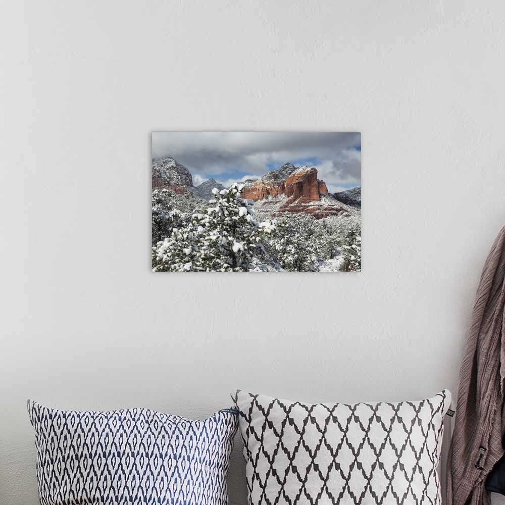 A bohemian room featuring The red rocks of Sedona, Arizona covered in snow.