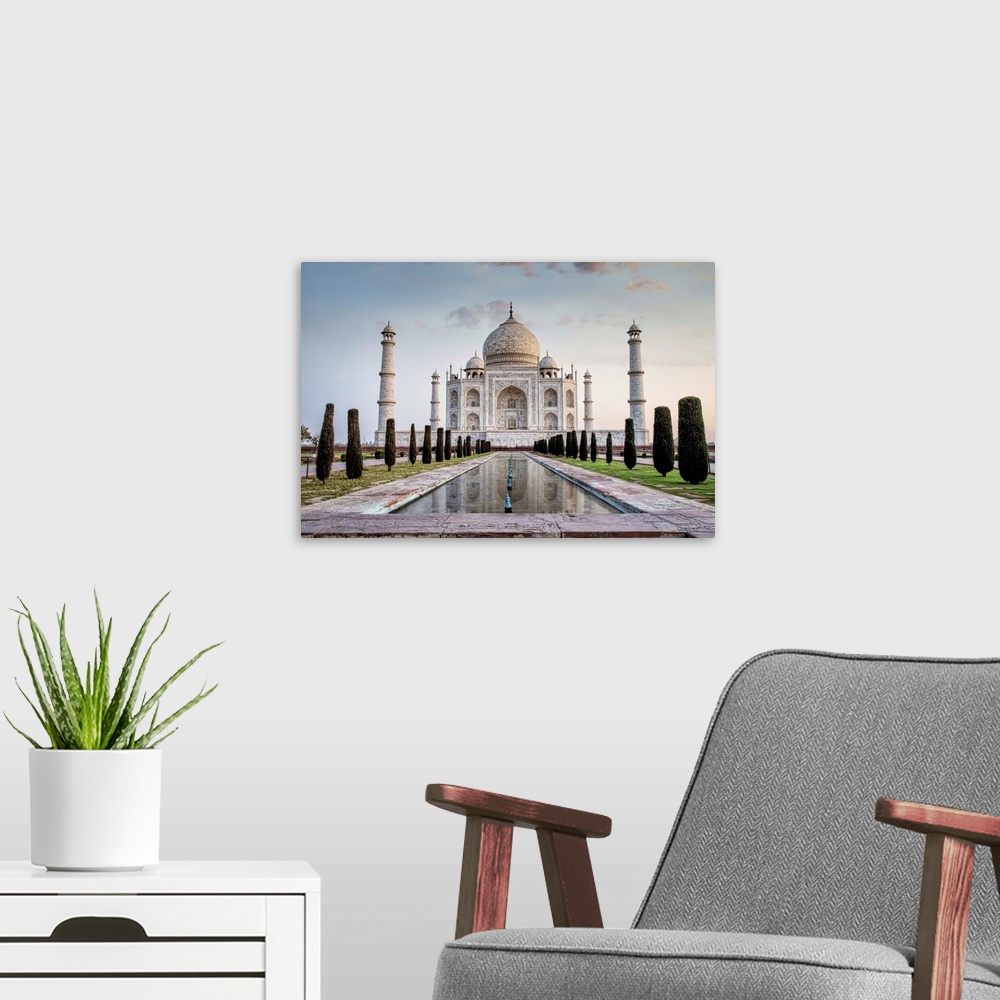 A modern room featuring The Taj Mahal at sunrise