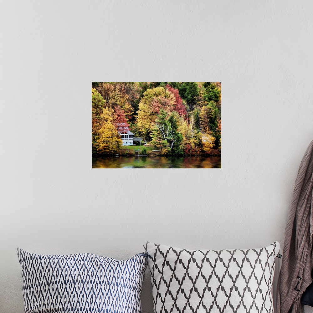 A bohemian room featuring Trees and lake with fall color in Vermont