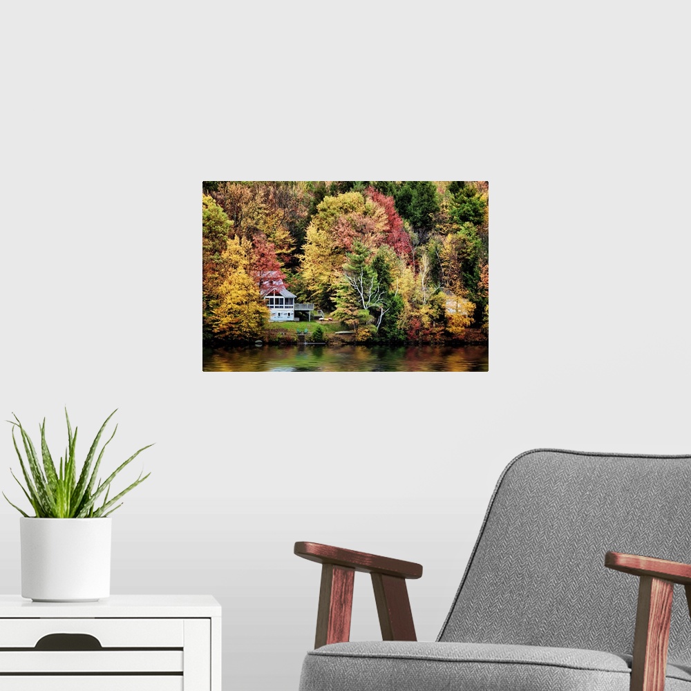 A modern room featuring Trees and lake with fall color in Vermont