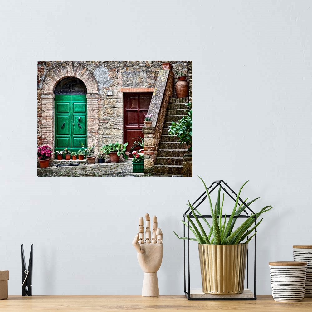 A bohemian room featuring A rustic city street and ancient home built from stone and brick with brightly painted doorways l...