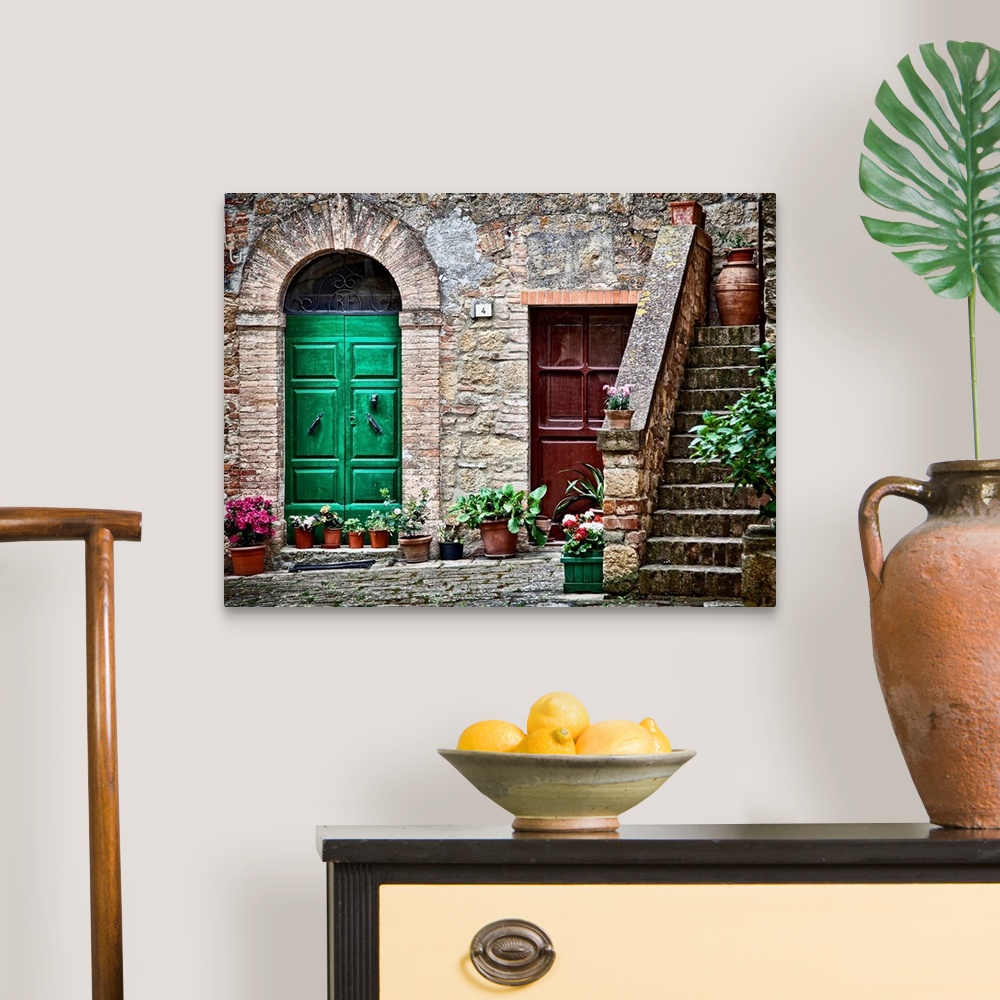 A traditional room featuring A rustic city street and ancient home built from stone and brick with brightly painted doorways l...