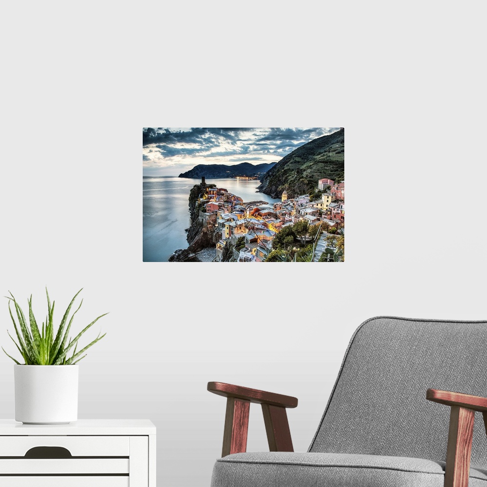 A modern room featuring Vernazza in the Cinque Terre at sunset.