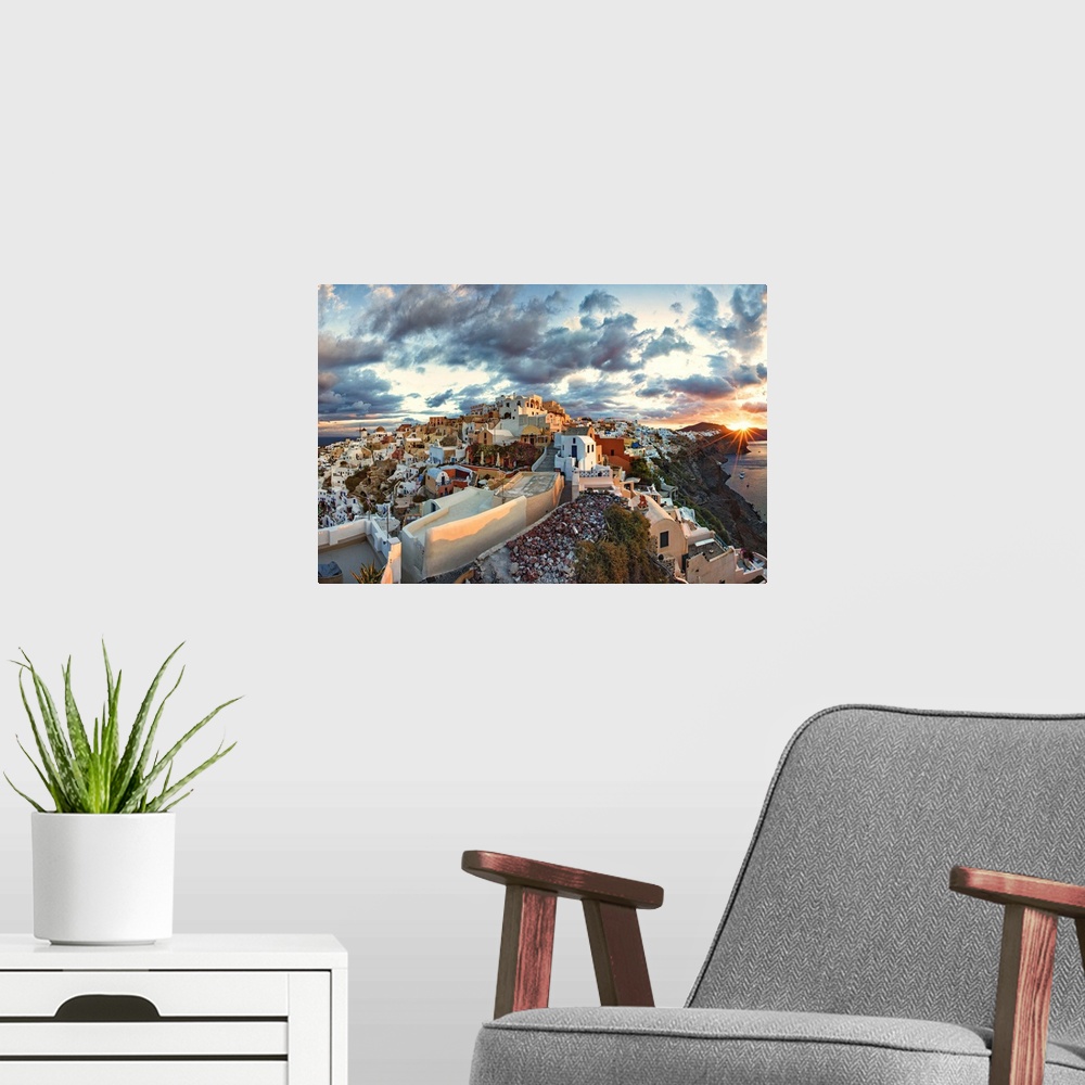 A modern room featuring Panorama view of Oia, Santorini at sunrise