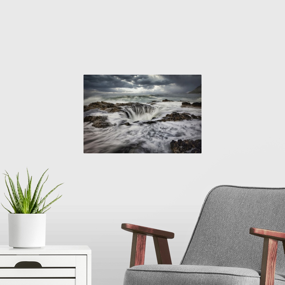 A modern room featuring Waves crashing into Thors Well on the Oregon Coast.
