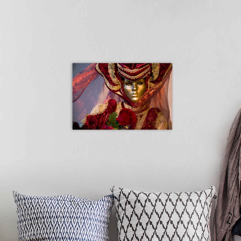 A bohemian room featuring Large photo on canvas of a woman dressed up wearing a smooth mask in Italy.