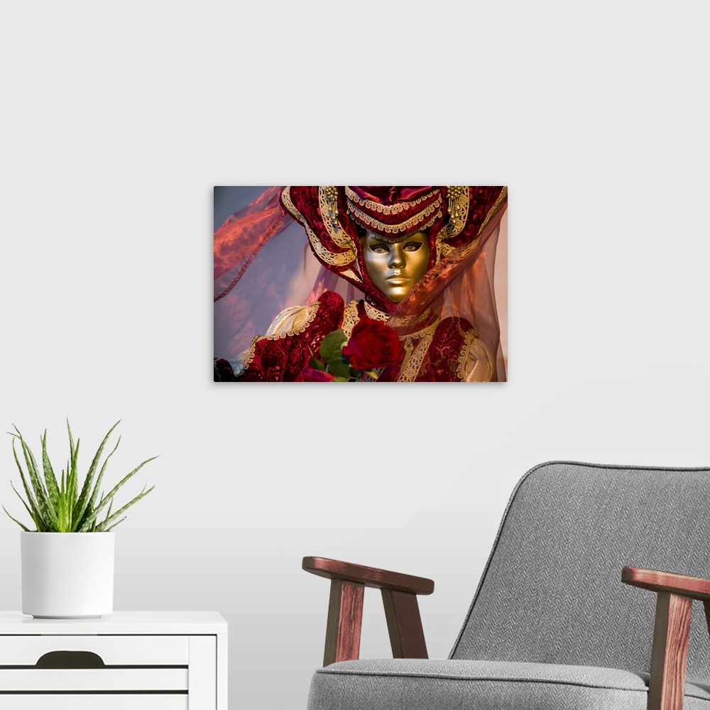 A modern room featuring Large photo on canvas of a woman dressed up wearing a smooth mask in Italy.