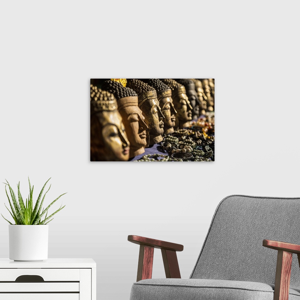 A modern room featuring Wooden buddha heads in Inle Lake, Burma