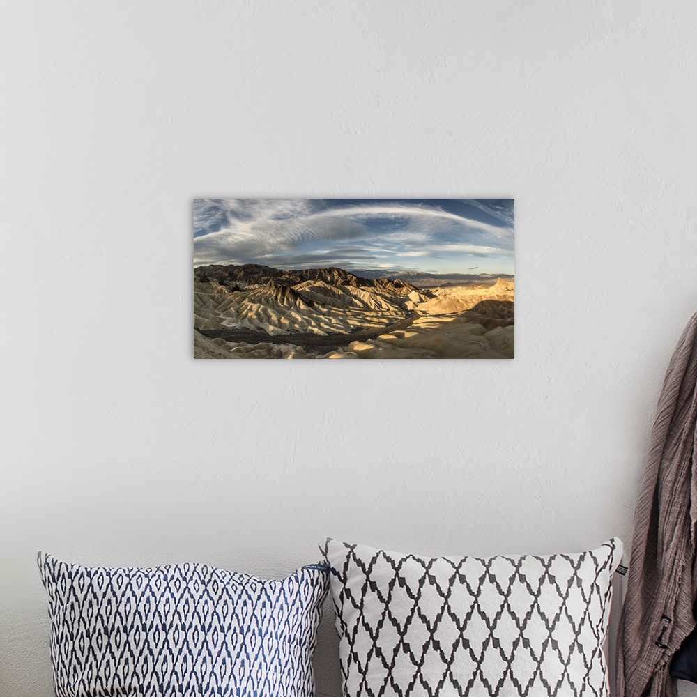 A bohemian room featuring Zabriski Point panorama in Death Valley at sunrise.