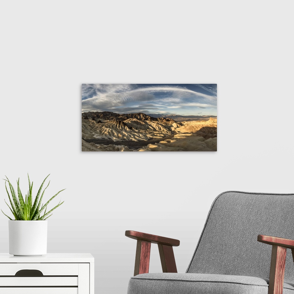A modern room featuring Zabriski Point panorama in Death Valley at sunrise.