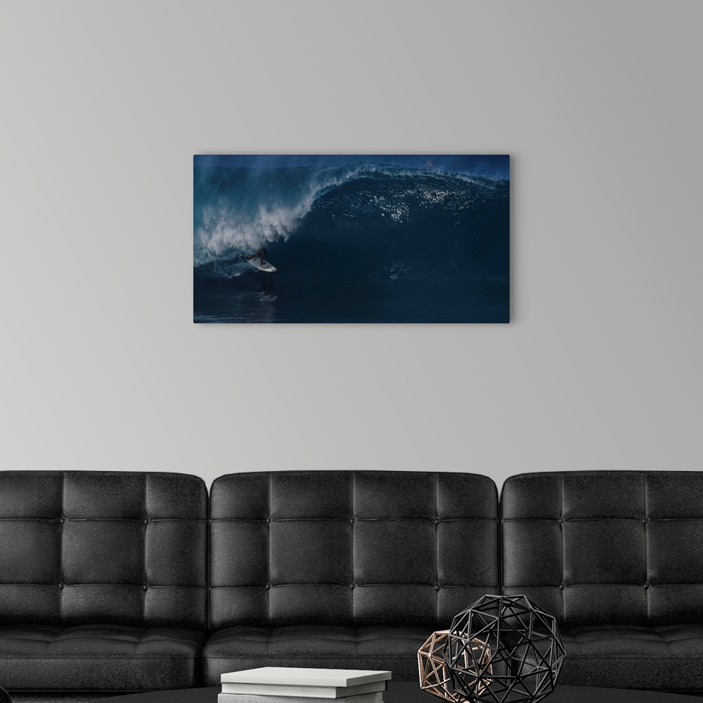 A modern room featuring A surfer gets shacked at the infamous Pipeline, Northshore Oahu.