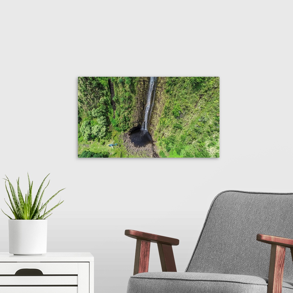 A modern room featuring Aerial photograph of a waterfall on the north east shore of Hawaii's big island
