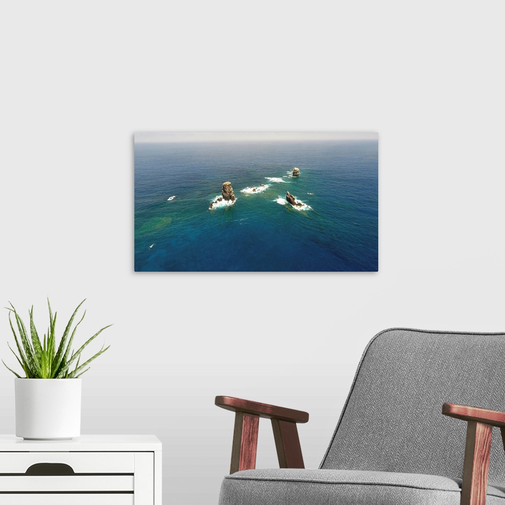 A modern room featuring Aerial photograph of Alijos Rocks off the coast of Mexico