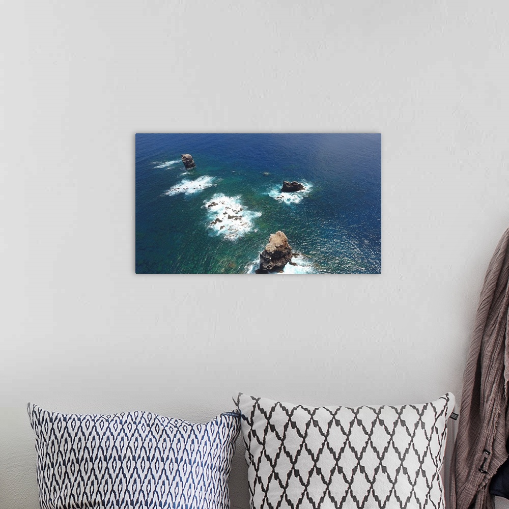 A bohemian room featuring Aerial photograph of Alijos Rocks off the coast of Mexico