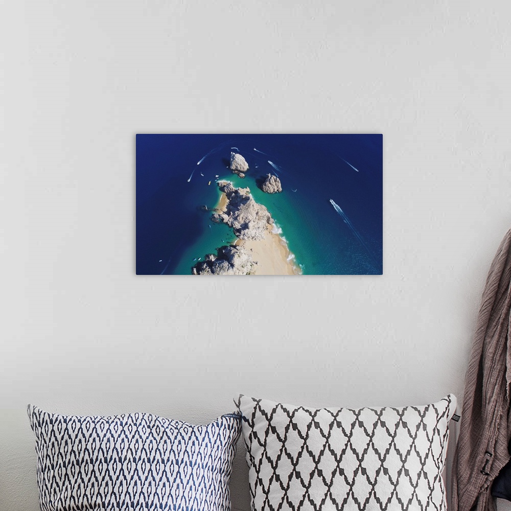 A bohemian room featuring Aerial photograph of the rocks off the tip of the Baja peninsula, Cabo San Lucas, Mexico
